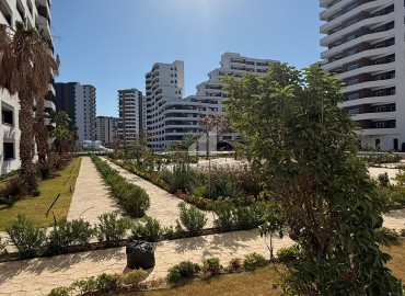 Апартаменты 1+1, 70м², в элитном комплексе на окончательном этапе строительства в районе Томюк, Эрдемли ID-18375 фото-18