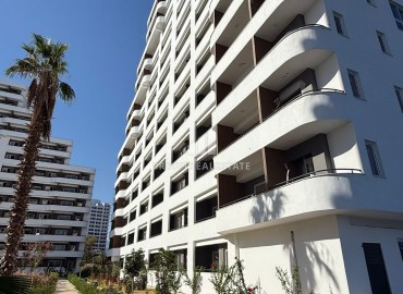 Апартаменты 1+1, 70м², в элитном комплексе на окончательном этапе строительства в районе Томюк, Эрдемли ID-18375 фото-19