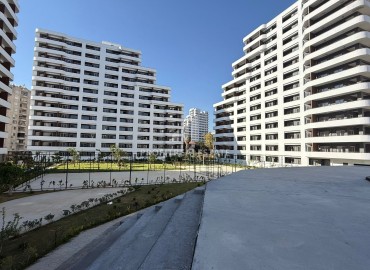 Апартаменты 1+1, 70м², в элитном комплексе на окончательном этапе строительства в районе Томюк, Эрдемли ID-18375 фото-20