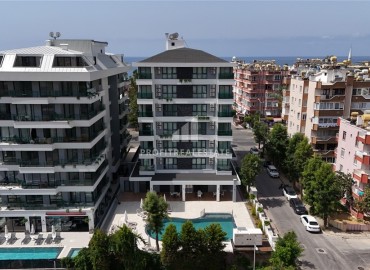 Квартиры-студии, двухкомнатные и трехкомнатные квартиры, 31-65м², в новом проекте в центре Алании, 50м от моря ID-13066 фото-10