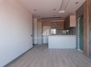 Новая недвижимость в Анталии: квартира с двумя спальнями, 70м², в новостройке в районе Муратпаша ID-18385 фото-2