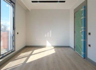 Новая недвижимость в Анталии: квартира с двумя спальнями, 70м², в новостройке в районе Муратпаша ID-18385 фото-6