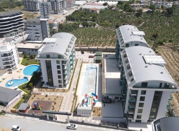 От строительной компании: квартиры 1+1 и 2+1, 48-100м², в элитном комплексе в престижном районе Каргыджак ID-17143 фото-2