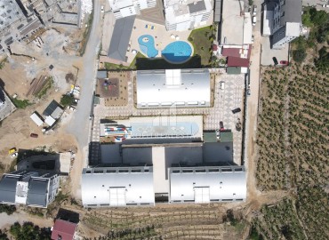 От строительной компании: квартиры 1+1 и 2+1, 48-100м², в элитном комплексе в престижном районе Каргыджак ID-17143 фото-5