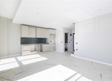 Дуплекс с двумя спальнями в стиле «лофт», 85м², в комплексе премиум класса в 300м от моря в районе Каргыджак, Алания ID-18392 фото-2