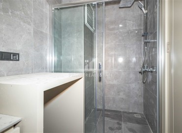 Дуплекс с двумя спальнями в стиле «лофт», 85м², в комплексе премиум класса в 300м от моря в районе Каргыджак, Алания ID-18392 фото-11