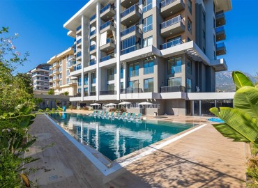 Дуплекс с двумя спальнями в стиле «лофт», 85м², в комплексе премиум класса в 300м от моря в районе Каргыджак, Алания ID-18392 фото-18