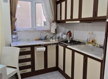 Недорогая вторичная недвижимость: квартира 1+1, 50м², в 250м от моря с мебелью и техникой в Махмутларе, Алания ID-18396 фото-3