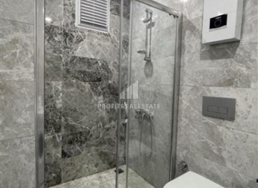 Стильные апартаменты 1+1, 55м², в элитном комплексе в 300 метрах от моря в районе Кестель, Алания ID-18398 фото-8