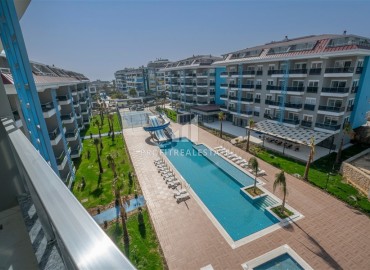 Стильные апартаменты 1+1, 55м², в элитном комплексе в 300 метрах от моря в районе Кестель, Алания ID-18398 фото-12