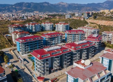 Стильные апартаменты 1+1, 55м², в элитном комплексе в 300 метрах от моря в районе Кестель, Алания ID-18398 фото-14