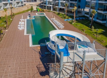 Стильные апартаменты 1+1, 55м², в элитном комплексе в 300 метрах от моря в районе Кестель, Алания ID-18398 фото-16