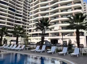 Двухкомнатная квартира, 70м², на высоком этаже в комплексе премиум класса в 350м от моря в Эрдемли, Арпачбахшиш ID-18403 фото-1