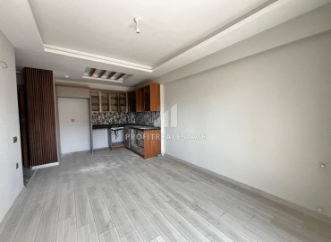Двухкомнатная квартира, 70м², на высоком этаже в комплексе премиум класса в 350м от моря в Эрдемли, Арпачбахшиш ID-18403 фото-2