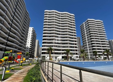 Двухкомнатная квартира, 70м², на высоком этаже в комплексе премиум класса в 350м от моря в Эрдемли, Арпачбахшиш ID-18403 фото-7