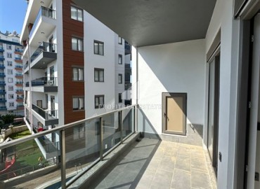 Новая квартира с одной спальней, 50м², в комфортабельном комплексе, в 550м от моря в районе Тосмур, Алания ID-18404 фото-10