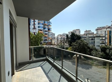 Новая квартира с одной спальней, 50м², в комфортабельном комплексе, в 550м от моря в районе Тосмур, Алания ID-18404 фото-11