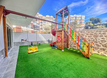 Новая квартира с одной спальней, 50м², в комфортабельном комплексе, в 550м от моря в районе Тосмур, Алания ID-18404 фото-17