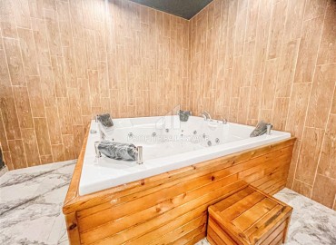 Новая квартира с одной спальней, 50м², в комфортабельном комплексе, в 550м от моря в районе Тосмур, Алания ID-18404 фото-20