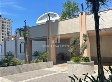 Комфортабельная двухкомнатная квартира, 58,5м², в комплексе с полной инфраструктурой, у моря в Махмутларе, Алания ID-18409 фото-3