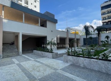 Комфортабельная двухкомнатная квартира, 58,5м², в комплексе с полной инфраструктурой, у моря в Махмутларе, Алания ID-18409 фото-4