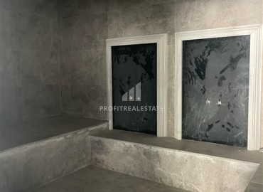 Комфортабельная двухкомнатная квартира, 58,5м², в комплексе с полной инфраструктурой, у моря в Махмутларе, Алания ID-18409 фото-8