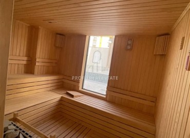 Комфортабельная двухкомнатная квартира, 58,5м², в комплексе с полной инфраструктурой, у моря в Махмутларе, Алания ID-18409 фото-10