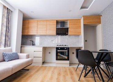 Меблированная газифицированная двухкомнатная квартира, 55м², в районе Муратпаша, Анталия, по отличной цене ID-18411 фото-2