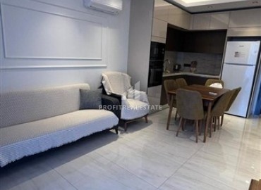 Меблированные апартаменты 1+1, 55м², в комплексе с отельной инфраструктурой на первой береговой линии в Махмутларе, Алания ID-18412 фото-2