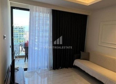 Меблированные апартаменты 1+1, 55м², в комплексе с отельной инфраструктурой на первой береговой линии в Махмутларе, Алания ID-18412 фото-3