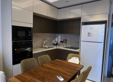 Меблированные апартаменты 1+1, 55м², в комплексе с отельной инфраструктурой на первой береговой линии в Махмутларе, Алания ID-18412 фото-4