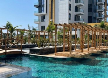 Меблированные апартаменты 1+1, 55м², в комплексе с отельной инфраструктурой на первой береговой линии в Махмутларе, Алания ID-18412 фото-14