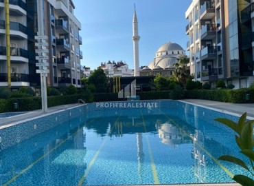 Двухкомнатная газифицированная квартира, 50м², в современном комплексе в 1,5км от моря в Анталии, Хурма ID-18413 фото-1