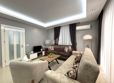 Стильная трехкомнатная квартира, 85м², в современном доме с парковкой в центре Алании, в 250 метрах от пляжа Клеопатра. ID-18414 фото-3