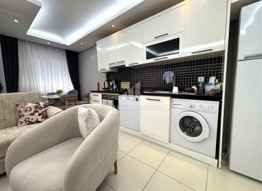 Стильная трехкомнатная квартира, 85м², в современном доме с парковкой в центре Алании, в 250 метрах от пляжа Клеопатра. ID-18414 фото-7