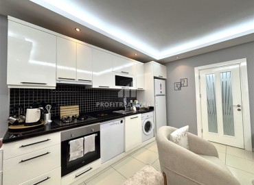 Стильная трехкомнатная квартира, 85м², в современном доме с парковкой в центре Алании, в 250 метрах от пляжа Клеопатра. ID-18414 фото-8