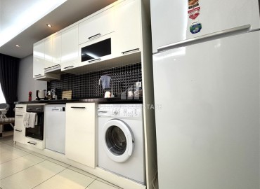 Стильная трехкомнатная квартира, 85м², в современном доме с парковкой в центре Алании, в 250 метрах от пляжа Клеопатра. ID-18414 фото-9