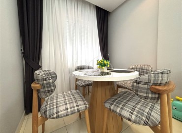 Стильная трехкомнатная квартира, 85м², в современном доме с парковкой в центре Алании, в 250 метрах от пляжа Клеопатра. ID-18414 фото-10