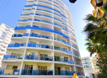 Меблированные двухкомнатные апартаменты, 65м², в комплексе премиум класса в 300м от моря в центре Махмутлара, Алания. ID-18415 фото-1