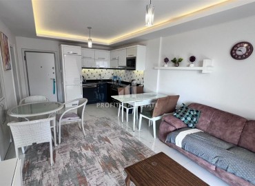 Меблированные двухкомнатные апартаменты, 65м², в комплексе премиум класса в 300м от моря в центре Махмутлара, Алания. ID-18415 фото-6