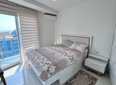 Меблированные двухкомнатные апартаменты, 65м², в комплексе премиум класса в 300м от моря в центре Махмутлара, Алания. ID-18415 фото-8