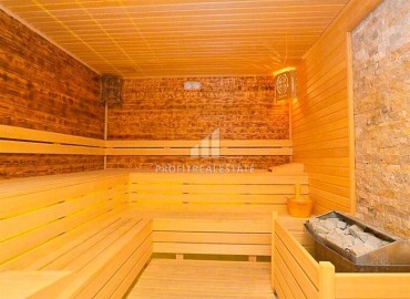 Меблированные двухкомнатные апартаменты, 65м², в комплексе премиум класса в 300м от моря в центре Махмутлара, Алания. ID-18415 фото-14