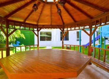 Меблированные двухкомнатные апартаменты, 65м², в комплексе премиум класса в 300м от моря в центре Махмутлара, Алания. ID-18415 фото-15