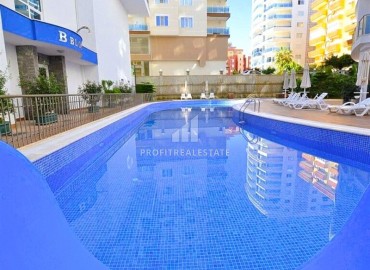 Меблированные двухкомнатные апартаменты, 65м², в комплексе премиум класса в 300м от моря в центре Махмутлара, Алания. ID-18415 фото-17