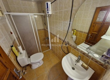 Недорогая вторичная недвижимость: трехкомнатная квартира с отдельной кухней, 95м², в 200м от моря в Махмутларе, Алания ID-18419 фото-8