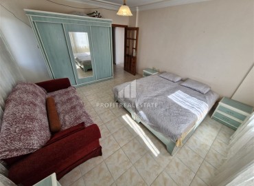 Недорогая вторичная недвижимость: трехкомнатная квартира с отдельной кухней, 95м², в 200м от моря в Махмутларе, Алания ID-18419 фото-9