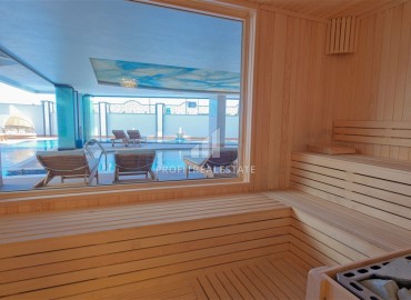 Уютная двухкомнатная квартира, 82,5м², в новостройке премиум класса на первой береговой линии в центре Алании под ВНЖ ID-18421 фото-20