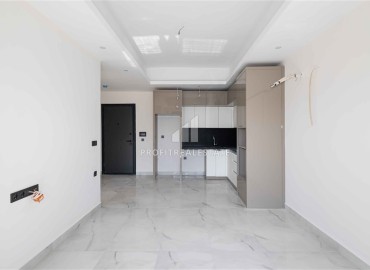 Апартаменты 1+1, 60м², с чистовой отделкой в элитном новом комплексе в районе Махмутлар, Алания ID-18422 фото-2