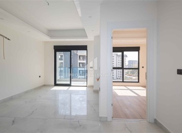 Апартаменты 1+1, 60м², с чистовой отделкой в элитном новом комплексе в районе Махмутлар, Алания ID-18422 фото-7
