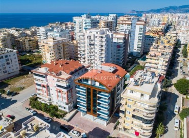 Элегантная квартира 2+1, 110м², в 250м от моря в комплексе с обширной инфраструктурой в Махмутларе, Алания ID-18424 фото-1